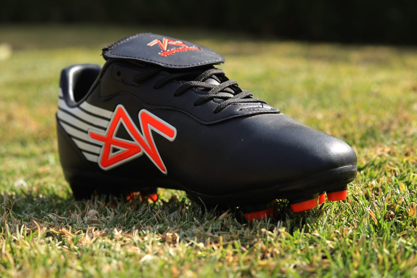 Shosholoza Alagiro Black and Orange Soccer Boot